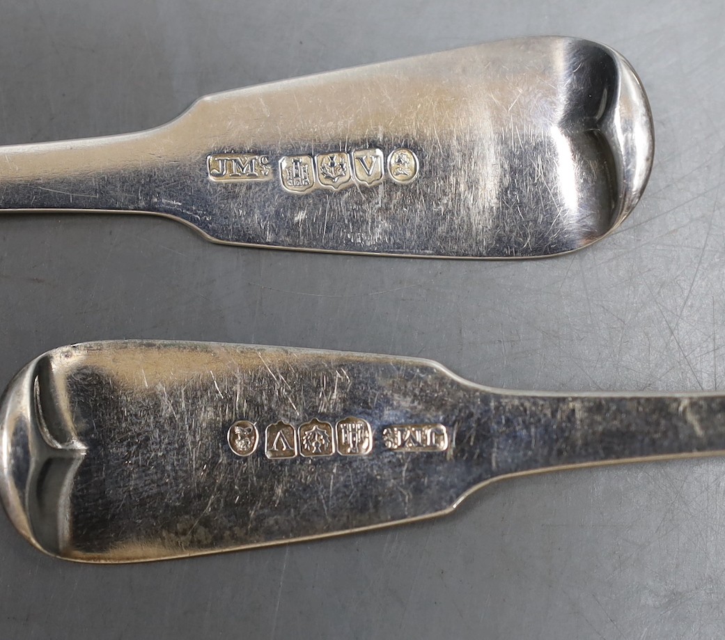 A pair of George IV Scottish silver fiddle pattern toddy ladles, James Mackay, Edinburgh 1827, and a Danish white metal sifting spoon.